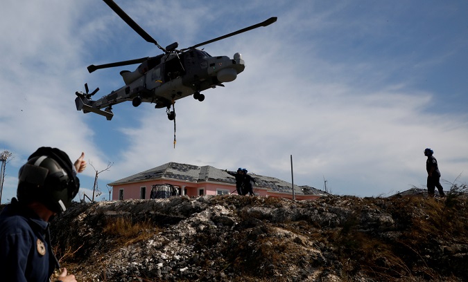 A Royal Navy helicopter takes off outside Marsh Harbour Healthcare Center after Hurricane Dorian hit the Abaco Islands in Marsh Harbour, Bahamas, September 5, 2019.