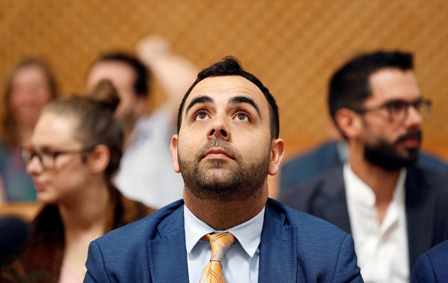 Omar Shakir, Human Rights Watch Israel and Palestine Director, looks up before his hearing at Israel's Supreme Court in Jerusalem September 24, 2019.