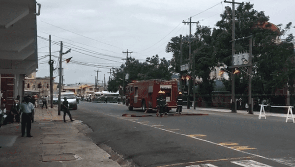 Firefighters respond to a bomb threat at the Gecom's command-center, Georgetown, Guyana, March 5, 2020.