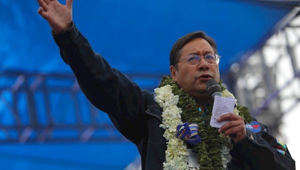 The victor of Bolivia's presidential elections for the Movement Towards Socialism (MAS) party, Luis Arce, addresses a crowd during his campaign's closing event. October 14, 2020. El Alto, Bolivia.
