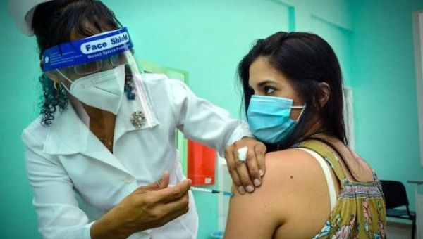 A health worker vaccinates a citizen in Havana, Cuba, May 2021.