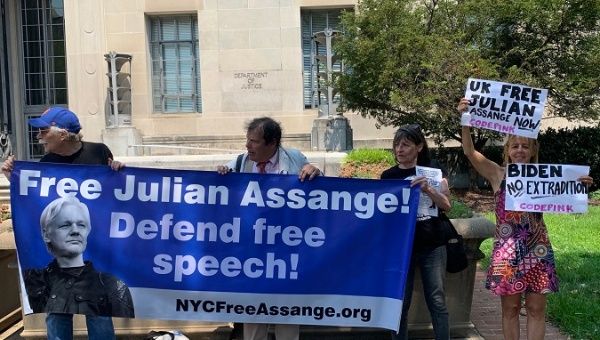 U.S. activists demand freedom for Assange outside of the Justice Department in Washington on July 28, 2021.