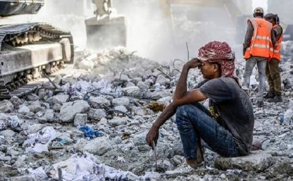 Workers in the Israeli bombed zone in Gaza, May 2021.