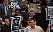 Colombians Hold Photos of People Missing at Pro-Peace Rally.