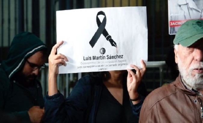 Sign claiming justice for Luis Martín Sánchez Íñiguez. Jul. 11, 2023.