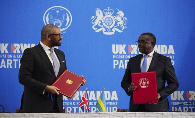 Britain's Home Secretary James Cleverly and Rwandan Foreign Minister Vincent Biruta signed the agreement in Kigali, the Rwandan capital. Dec. 6, 2023.