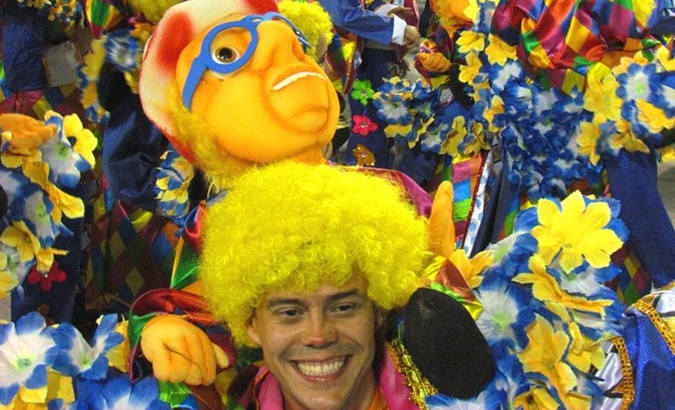 A citizen wearing a costume from a samba school, Brazil.
