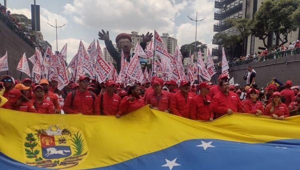 Workers parade through the streets of Caracas, May 1, 2024.