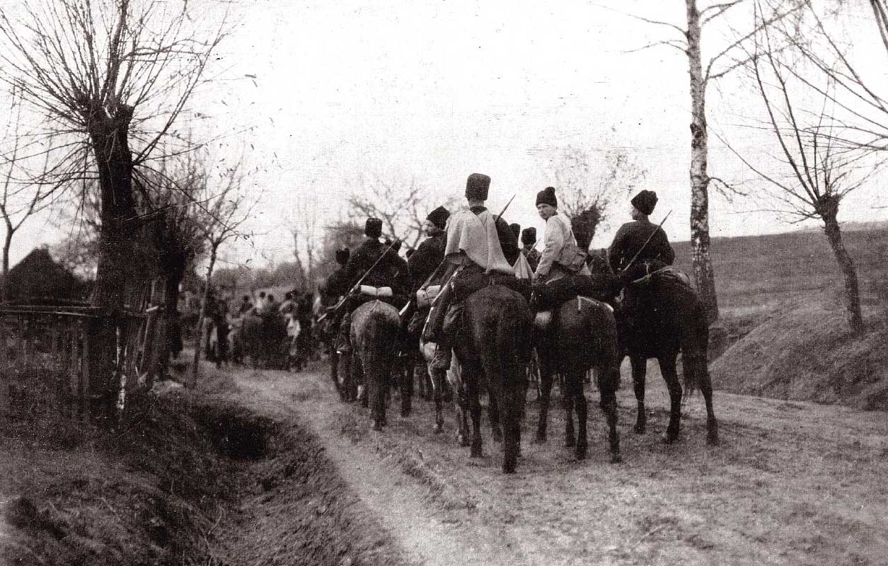 Russian Cossacks passing through a village in Galitzia.