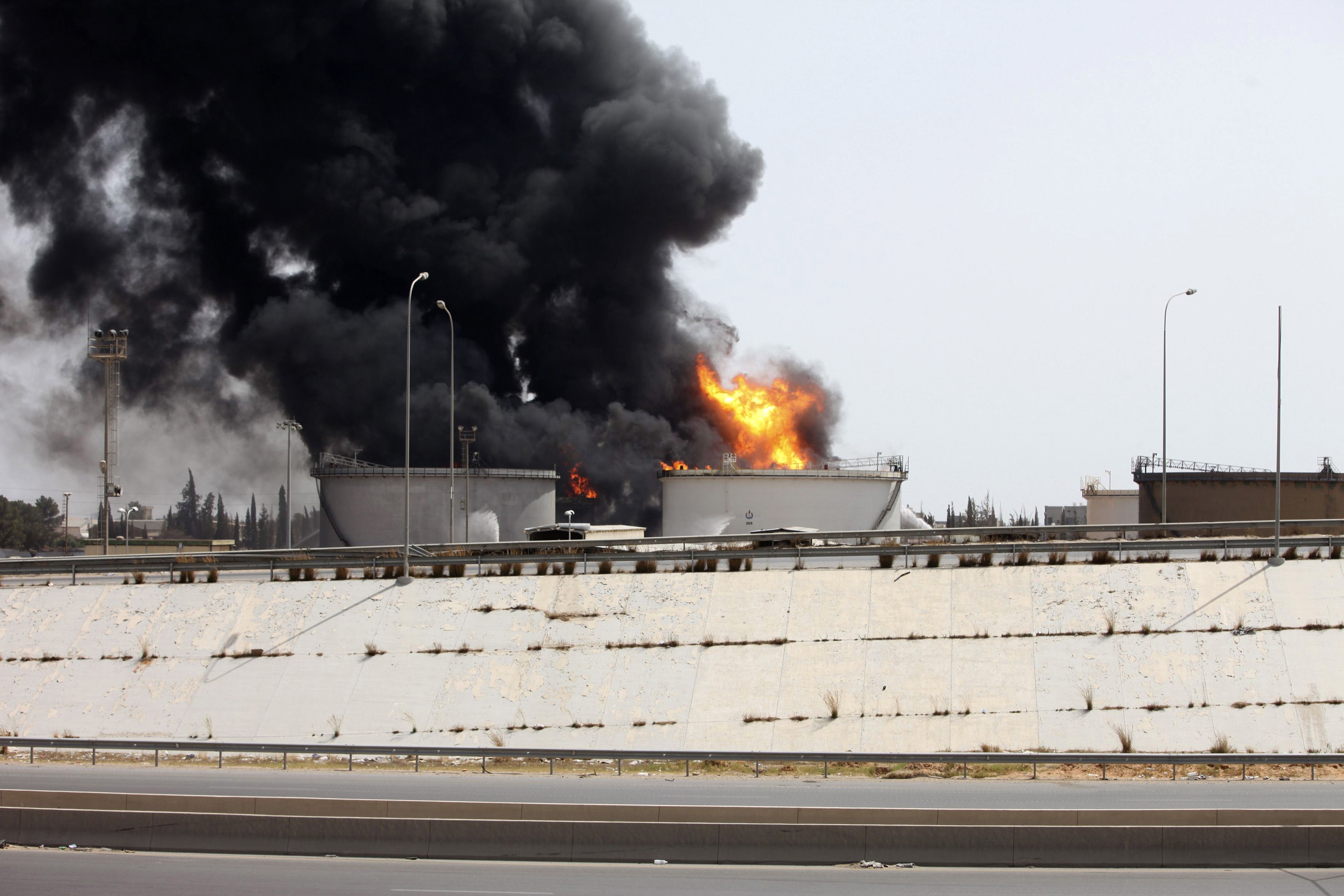 A general view shows fire burning at a fuel depot near the airport road in Tripoli July 29, 2014. (Photo: Reuters)