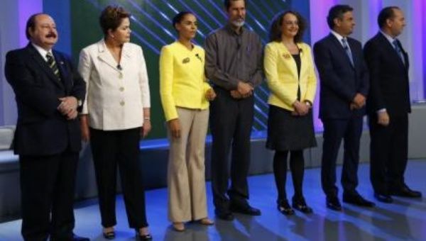Brazil's presidential candidates (from L to R) Levy Fidelix of Brazilian Labour Renewal Party (PRTB) , Dilma Rousseff of Workers Party (PT), Marina Silva of Brazilian Socialist Party (PSB), Eduardo Jorge of Green Party (PV), Luciana Genro of Socialist Party (PSOL), Aecio Neves of Brazilian Social Democratic Party (PSDB), and Pastor Everaldo of Social Christian Party (PSC) take part in a TV debate in Rio de Janeiro on October 2 (Photo: Reuters).