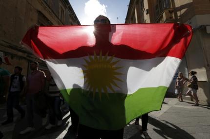 A Kurdish solidarity activist in Malta. (Photo: Reuters)