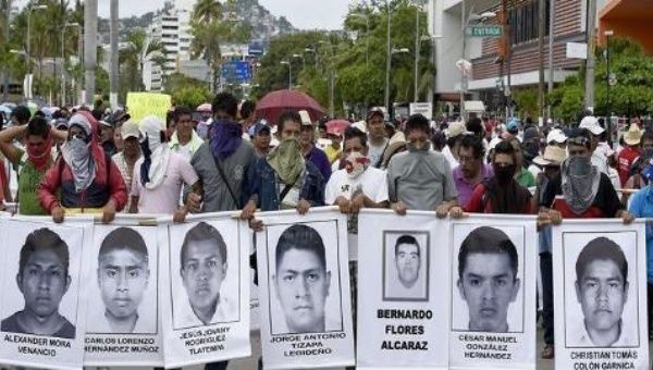 Protests continue in Mexico in a bid to pressure authorities to find the missing students. (Photo: Reuters)