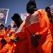 Protesters demanding the release of Guantanamo Bay detainees, which President Obama said he would do six years ago.