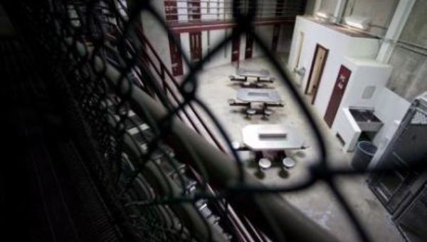 The interior of an unoccupied communal cellblock is seen at Camp VI, a prison used to house detainees at the U.S. Naval Base at Guantanamo. 