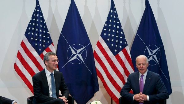 U.S. Vice President Joe Biden meets NATO Secretary General Jens Stoltenberg (L) during the 51st Munich Security Conference at the 'Bayerischer Hof' hotel in Munich February 7, 2015.