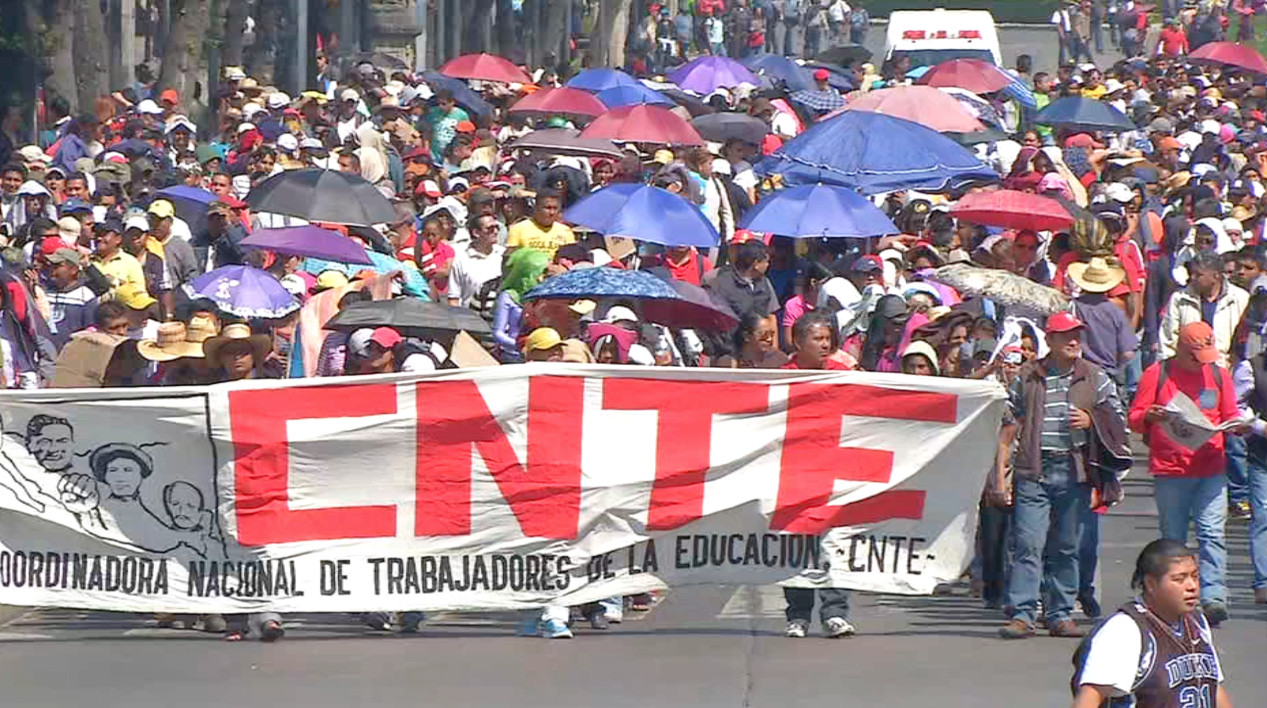 Dissident teachers marching down Mexico City's Reforma Avenue