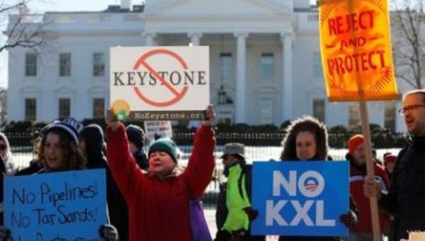 Activists hold a rally against government approval of the planned Keystone XL oil pipeline, in front of the White House in Washington