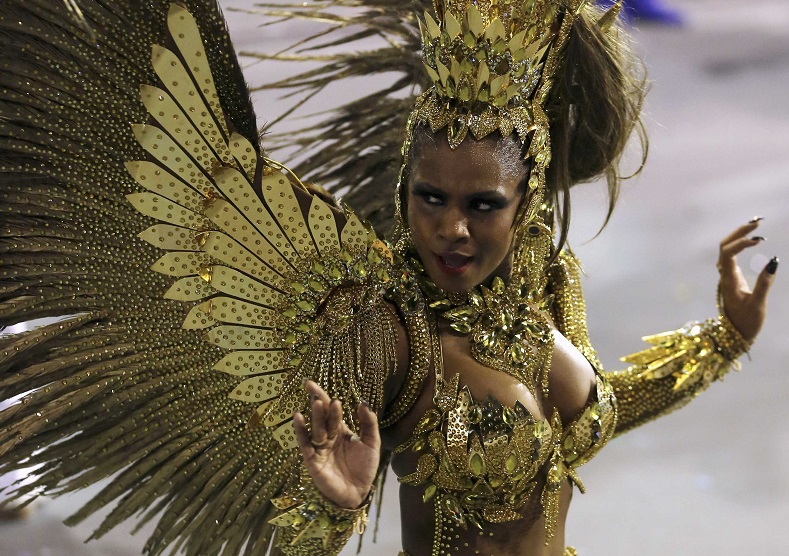 A performer from the Imperio da Casa Verde Samba School takes part in a carnival at Anhembi Sambadrome.