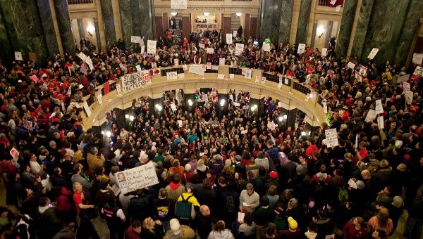 Protesters occupy the Wisconsin State Capitol in Madison, Wisconsin, late into the night March 9, 2011.