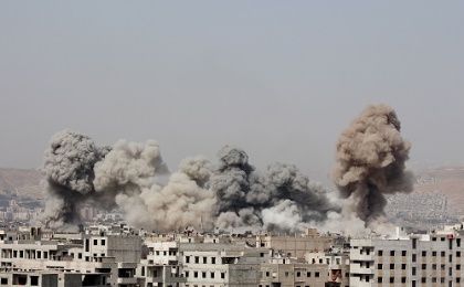 Smoke rises after what activists said were air strikes by forces loyal to Syria's President Bashar al-Assad in Arbeen, in the eastern Damascus suburb of Ghouta, March 8, 2015. 