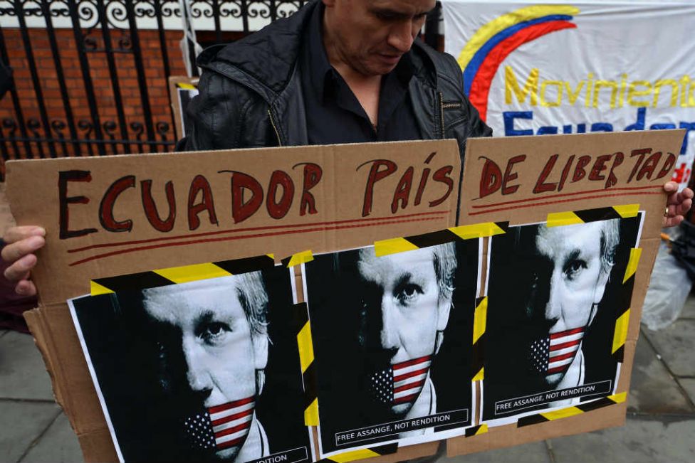 A supporter of Julian Assange holds a placard with the slogan 'Ecuador, country of freedom' written in Spanish outside the Ecuadorean embassy in London in 2012, two days after Assange turned up at the embassy seeking asylum.