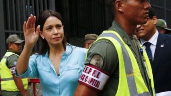The right-wing Venezuelan opposition leader Maria Corina Machado is facing a class-action lawsuit. 