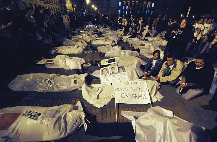 Protestors pose as the victims in the “false positives” scandal in 2009.