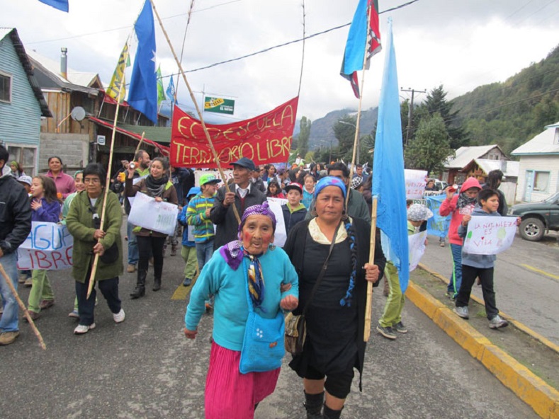Members of Mapuche communities march in Curarrehue, Chile to protest development projects in their lands, April 13, 2015.