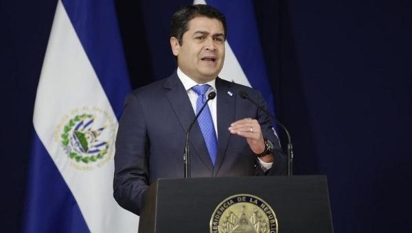 Honduras' President Juan Orlando Hernandez participates in a news conference, February 10, 2015.