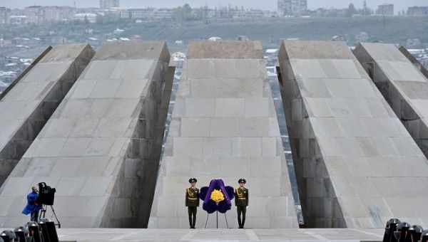 Soldiers stand guard in front of the Tsitsernakaberd Memorial in Armenia's capital of Yerevan, during the commemoration ceremony for the 100th anniversary of the Armenian genocide Friday.