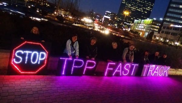  Activists in Dallas oppose the Trans-Pacific Partnership and “fast track.”