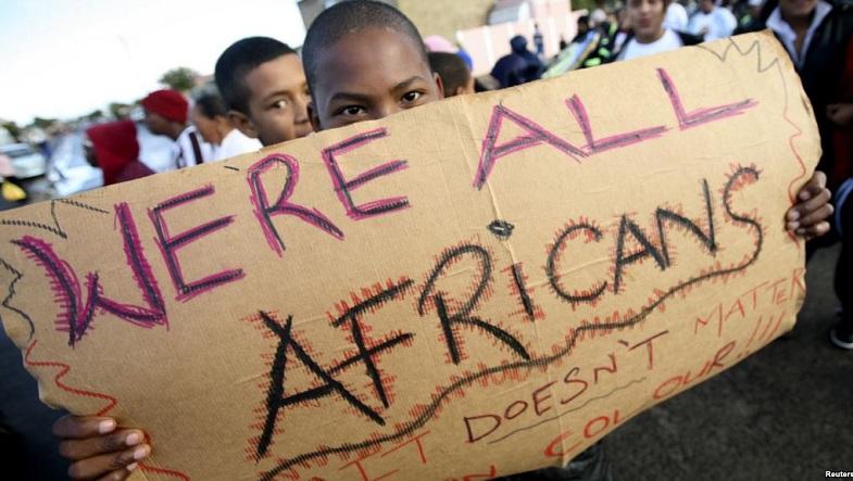 Migrants in Cape Town's Mannenberg community demonstrate against xenophobia in South Africa.