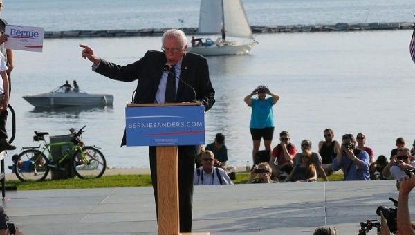 At Vermont's Lake Champlain, Democratic presidential candidate Sen. Bernie Sanders holds his 