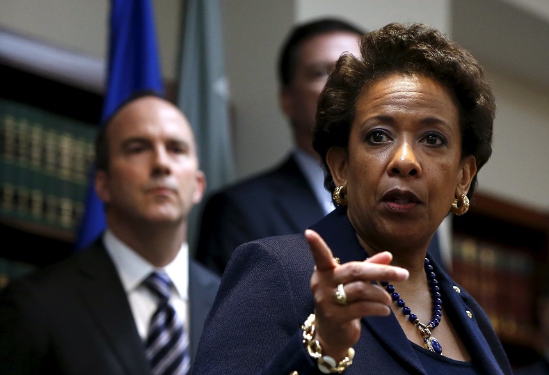 U.S. Attorney General Loretta Lynch points during a news conference at the U.S. Attorney's Office of the Eastern District of New York in the Brooklyn borough of New York May 27, 2015. U.S. authorities said nine soccer officials and five sports media and promotions executives faced corruption charges involving more than $150 million in bribes. In pursuit of the U.S. case, Swiss police arrested seven FIFA officials who are now awaiting extradition to the United States.