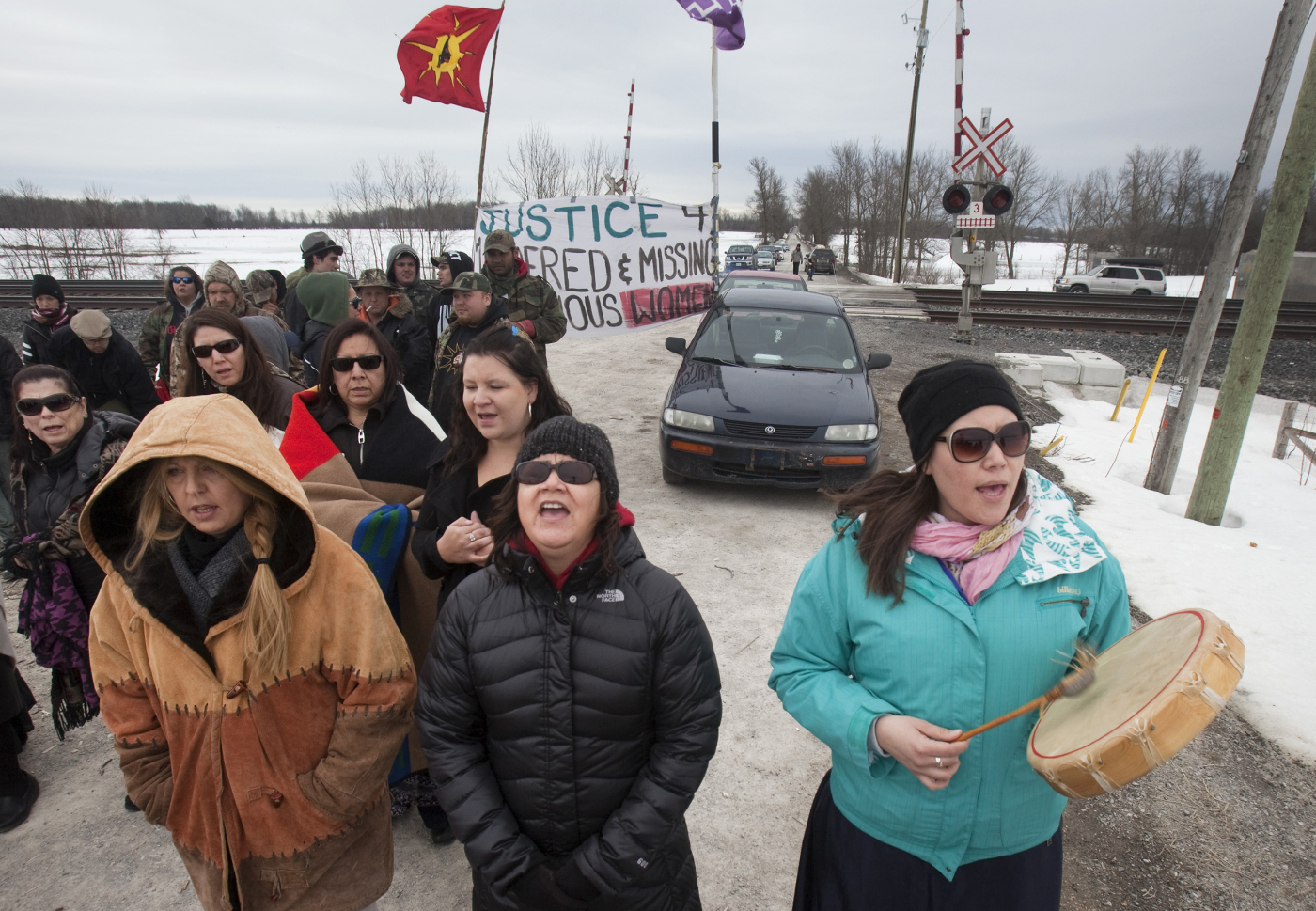 Protesters bang indigenous drums to protest the hundreds of missing or murdered indigenous women in the country, what many call institutional racism.