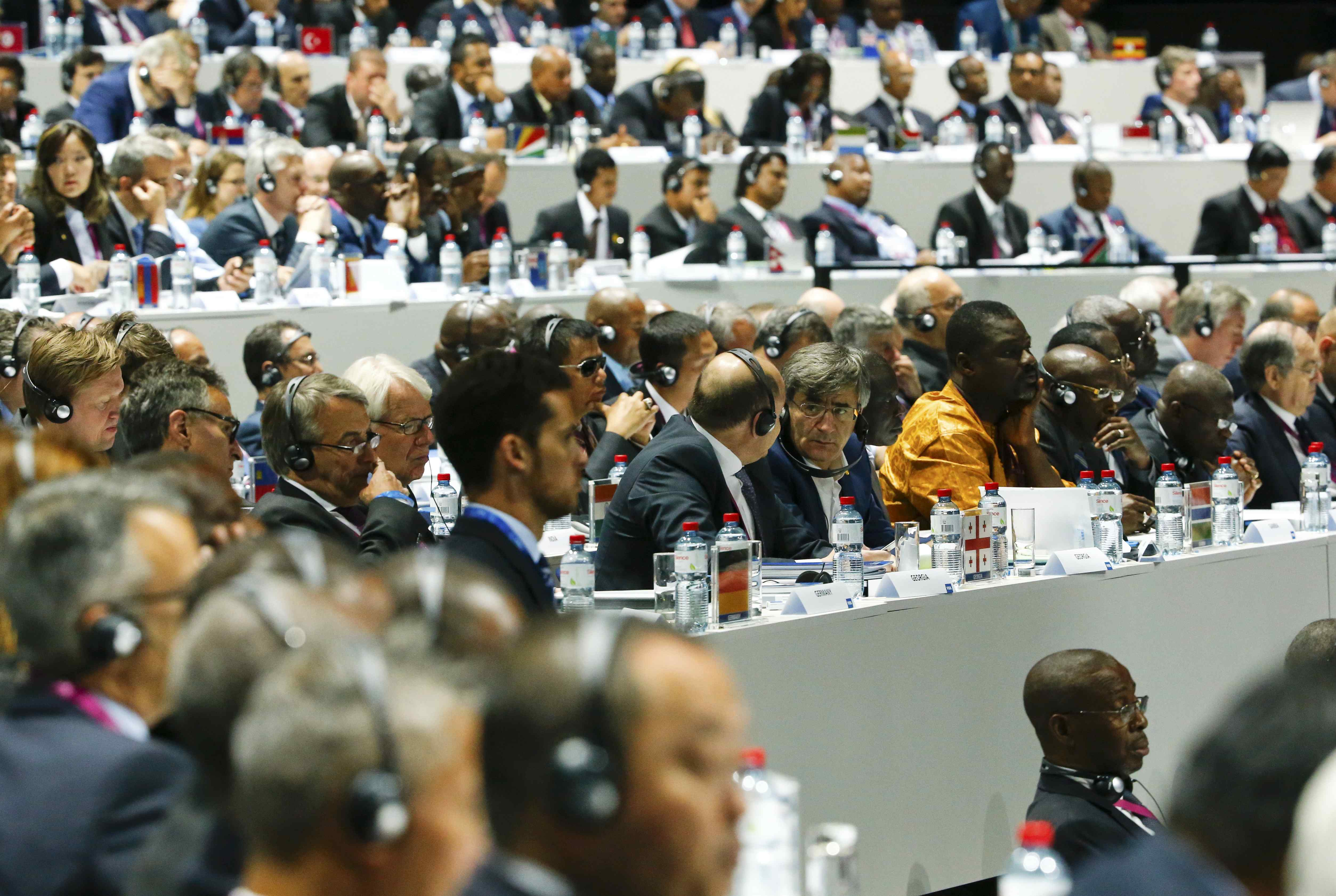Participants attend the 65th FIFA Congress in Zurich, Switzerland, following a hoax bomb threat.