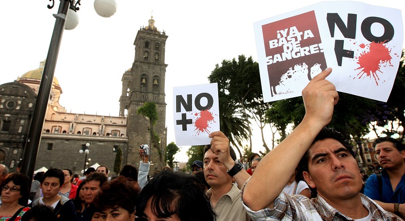 Puebla residents protest against violence in this file photo from 2011. Sign reads 