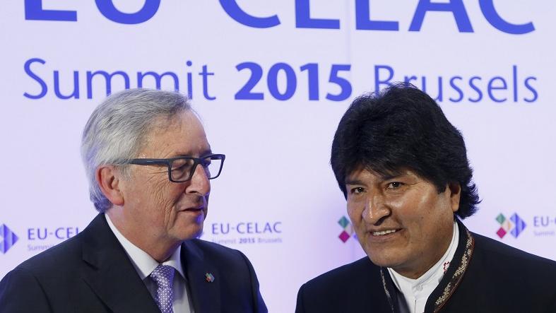 European Commission President Jean-Claude Juncker (L) welcomes Bolivia's president Evo Morales (R) at the start of an EU-CELAC Latin America summit June 10, 2015.