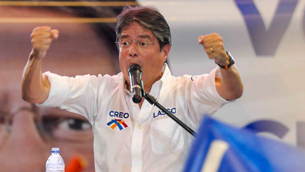 Guillermo Lasso speaking during a campaign rally in 2014.