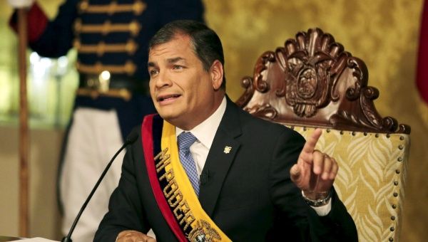 Ecuadorean President Rafael Correa gestures as he addresses a television broadcast to the nation from Carondelet Palace in Quito June 15, 2015.