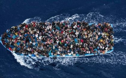 A boat carrying migrants in the Mediterranean, February 12, 2015. 
