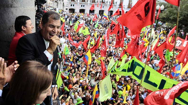 President Rafael Correa speaks to thousands of supporters from the presidential palace in Quito's main square, June 15, 2015.