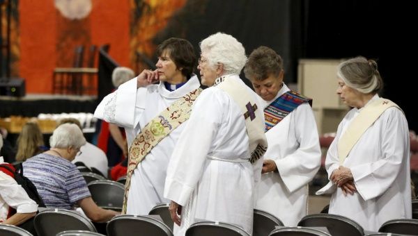 A group of deacons arrive for a church service during the General Convention of the Episcopal Church in Salt Lake City, Utah, June 28, 2015.