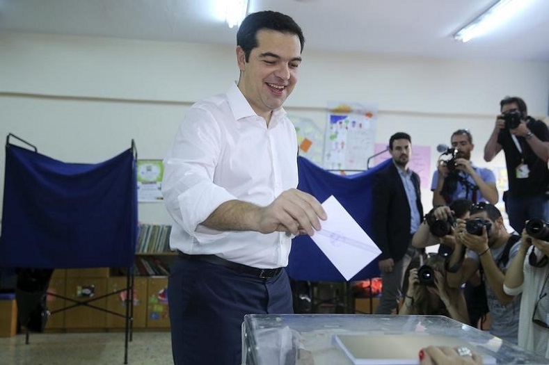 Greek Prime Minister Alexis Tsipras votes at a polling station in Athens, Greece July 5, 2015. 