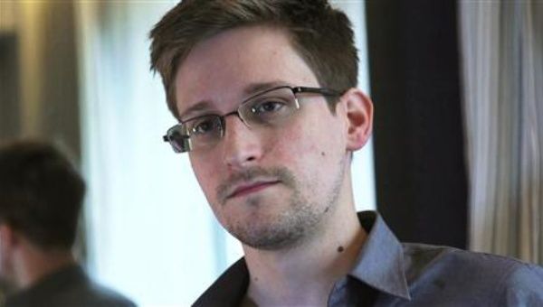 NSA whistleblower Edward Snowden, an analyst with a U.S. defence contractor, is seen in this still image taken from video during an interview by The Guardian in his hotel room in Hong Kong June 6, 2013.