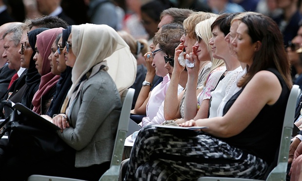 Mourners attend a memorial event to victims of the 7 July 2005 London bombings at the memorial in Hyde Park.