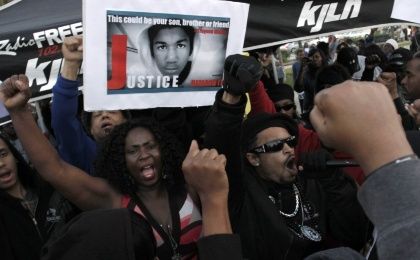Demonstrators gather to call for justice in the murder of Trayvon Martin at Leimert Park in Los Angeles, March 22, 2012.