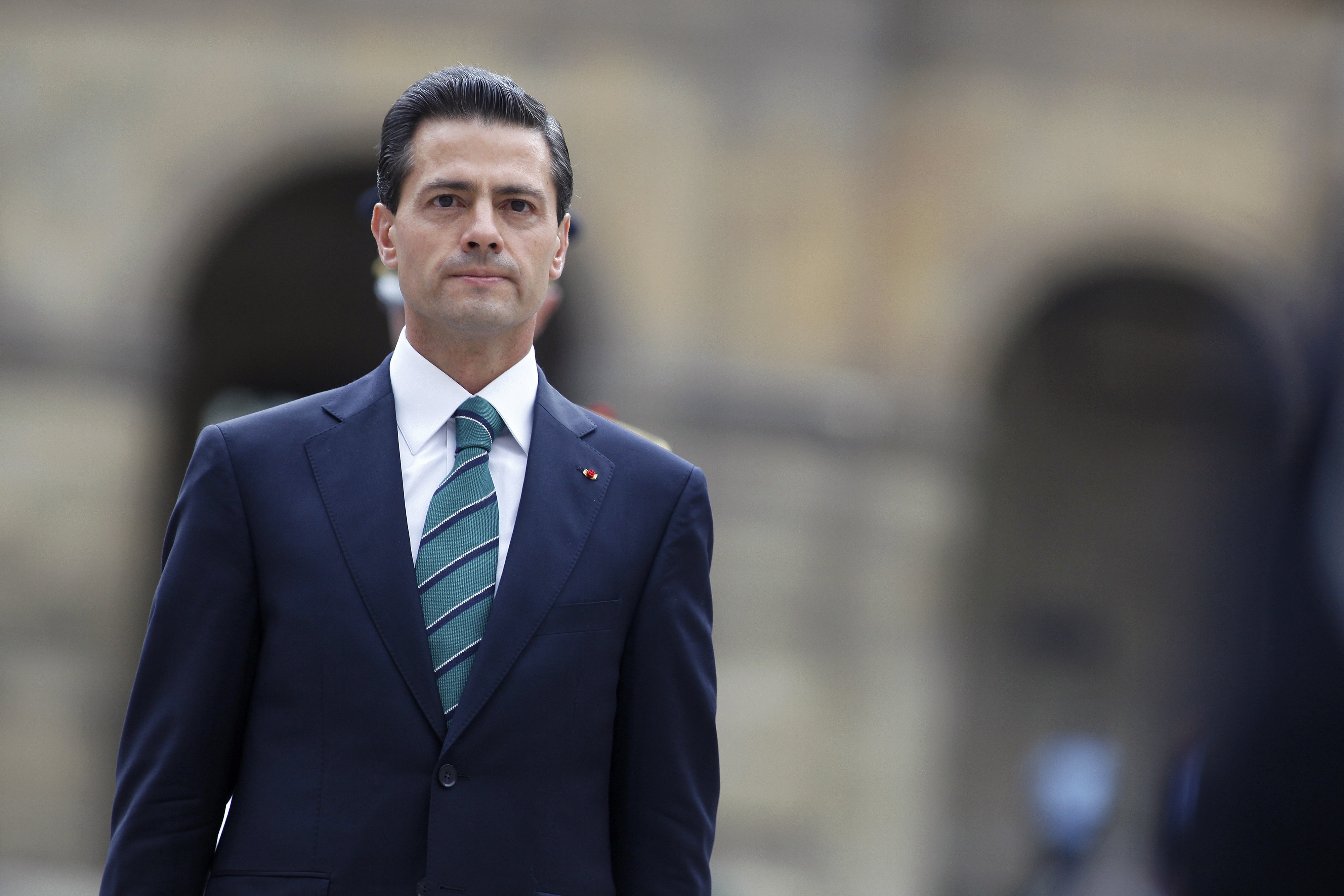 Protesters in Paris accused Peña Nieto's government of being mired in corruption and authoritarianism.