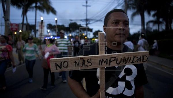 The torch march has been organized in Honduras every Friday for the last eight weeks to protest government corruption.